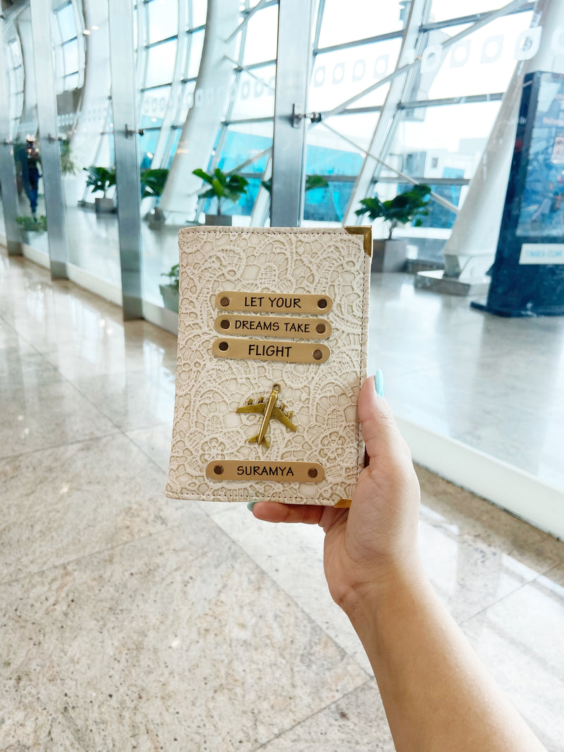 Personalized white passport cover by TPC Gifts at the airport